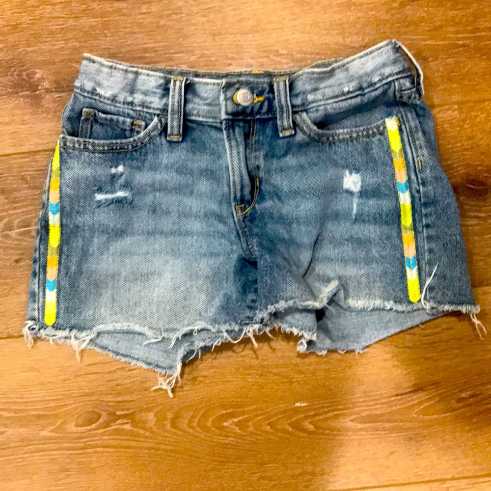 Blue shorts with color on the side